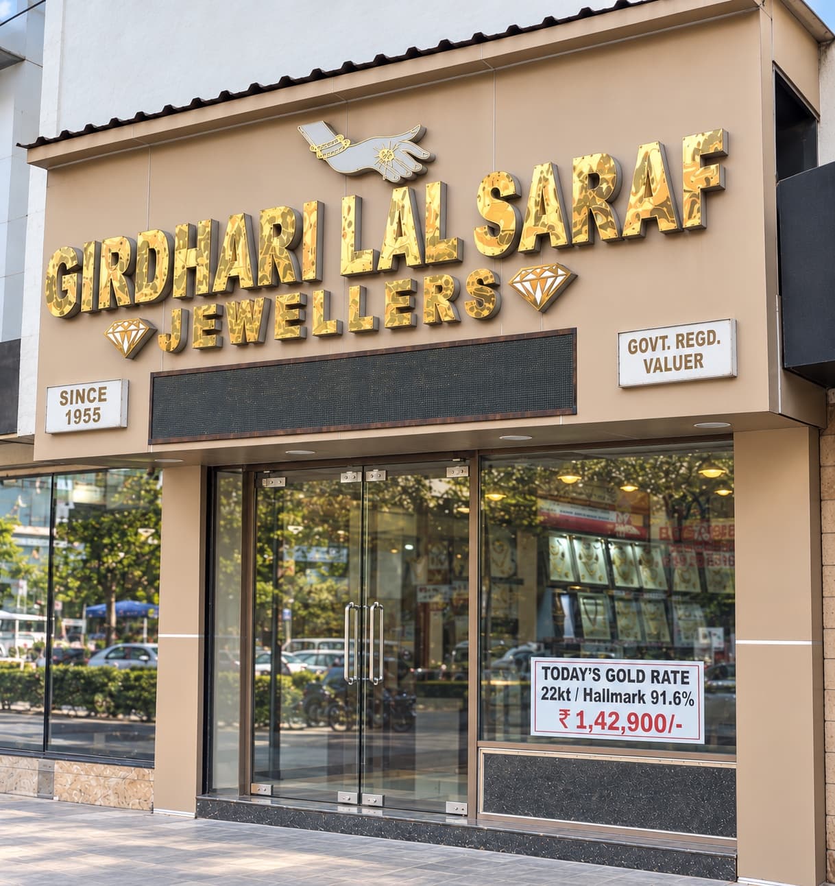 Girdhari Lal Saraf Jewellers shopfront on Ajmal Khan Road, Karol Bagh — gold signage, Since 1955, Govt. Regd. Valuer, and today's 22K gold rate in the window